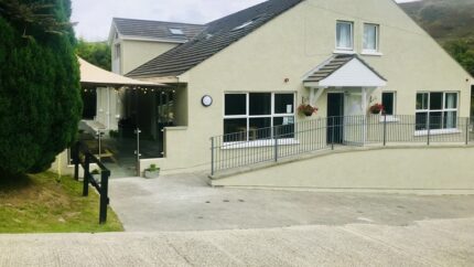 County Down Lodge Spa Break for 2 at East Coast Adventure: Hot Tub, Sauna, Prosecco, Chocolates & Pet Friendly Stay with Late Checkout | Wowcher