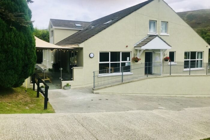 County Down Lodge Spa Break for 2 at East Coast Adventure: Hot Tub, Sauna, Prosecco, Chocolates & Pet Friendly Stay with Late Checkout | Wowcher